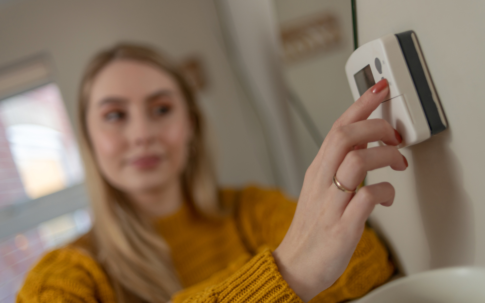 Reducing your thermostat temperature can help you save money