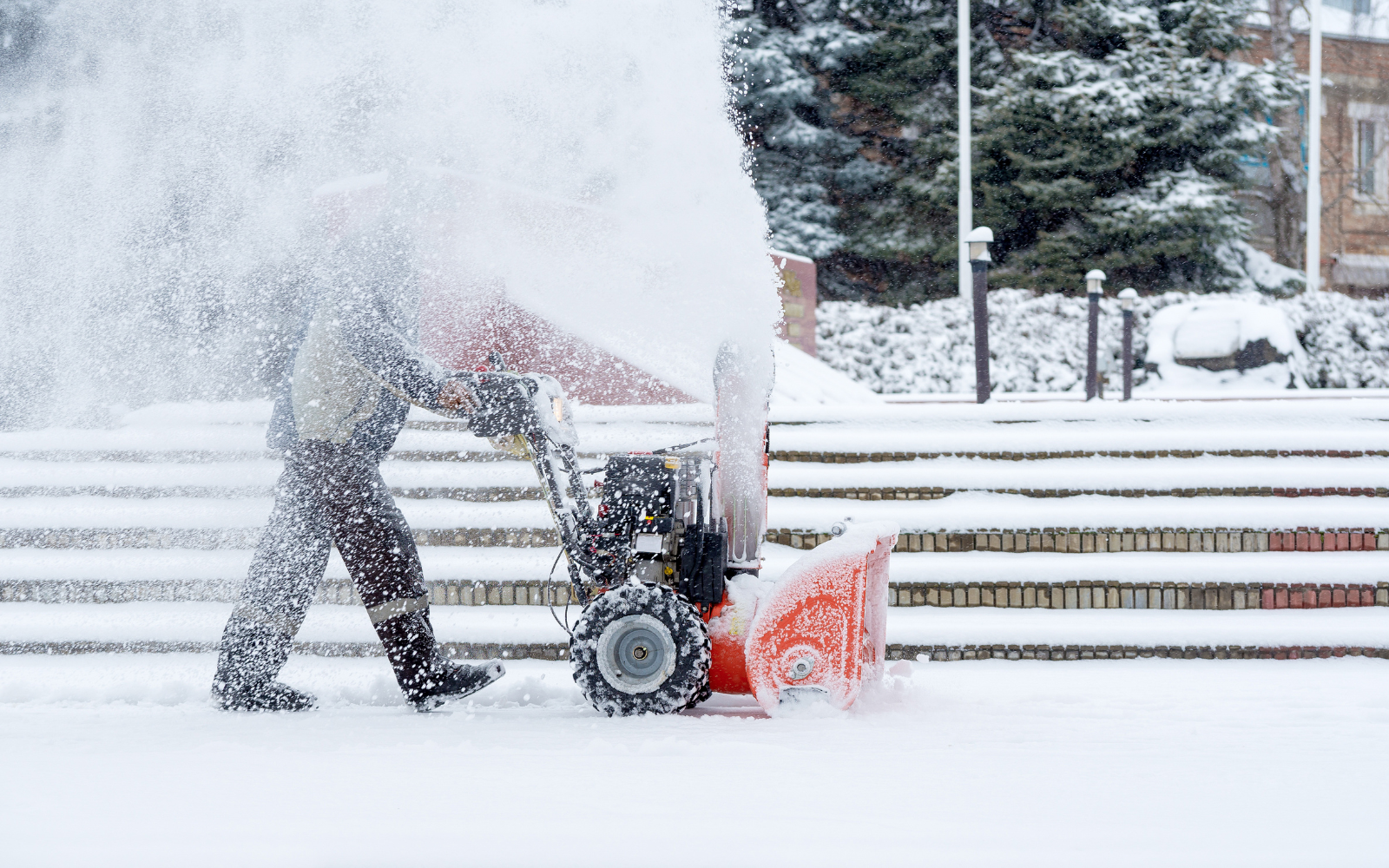 Boardwalk maintenance team removing snow for free at apartments